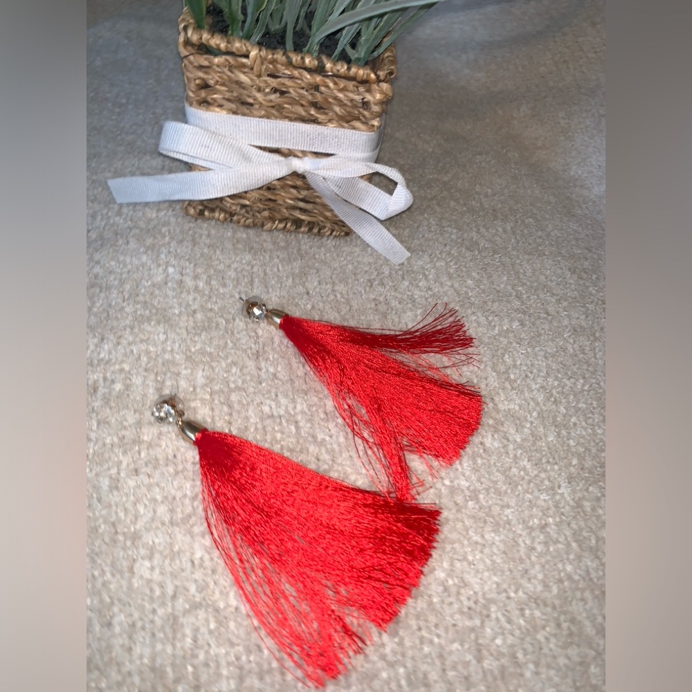 Bright red tassels statement earrings
